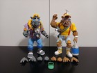 NECA Teenage Mutant Ninja Turtles Vacation Bebop and Vacation Rocksteady Figures