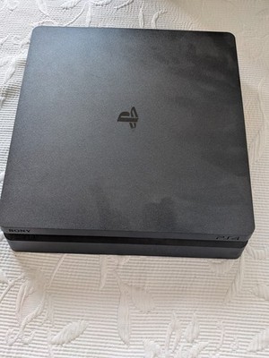 Sony PlayStation 4 Slim Konsole Schwarz + 4 Spiele (Spider-Man, FIFA 20 u.a.)