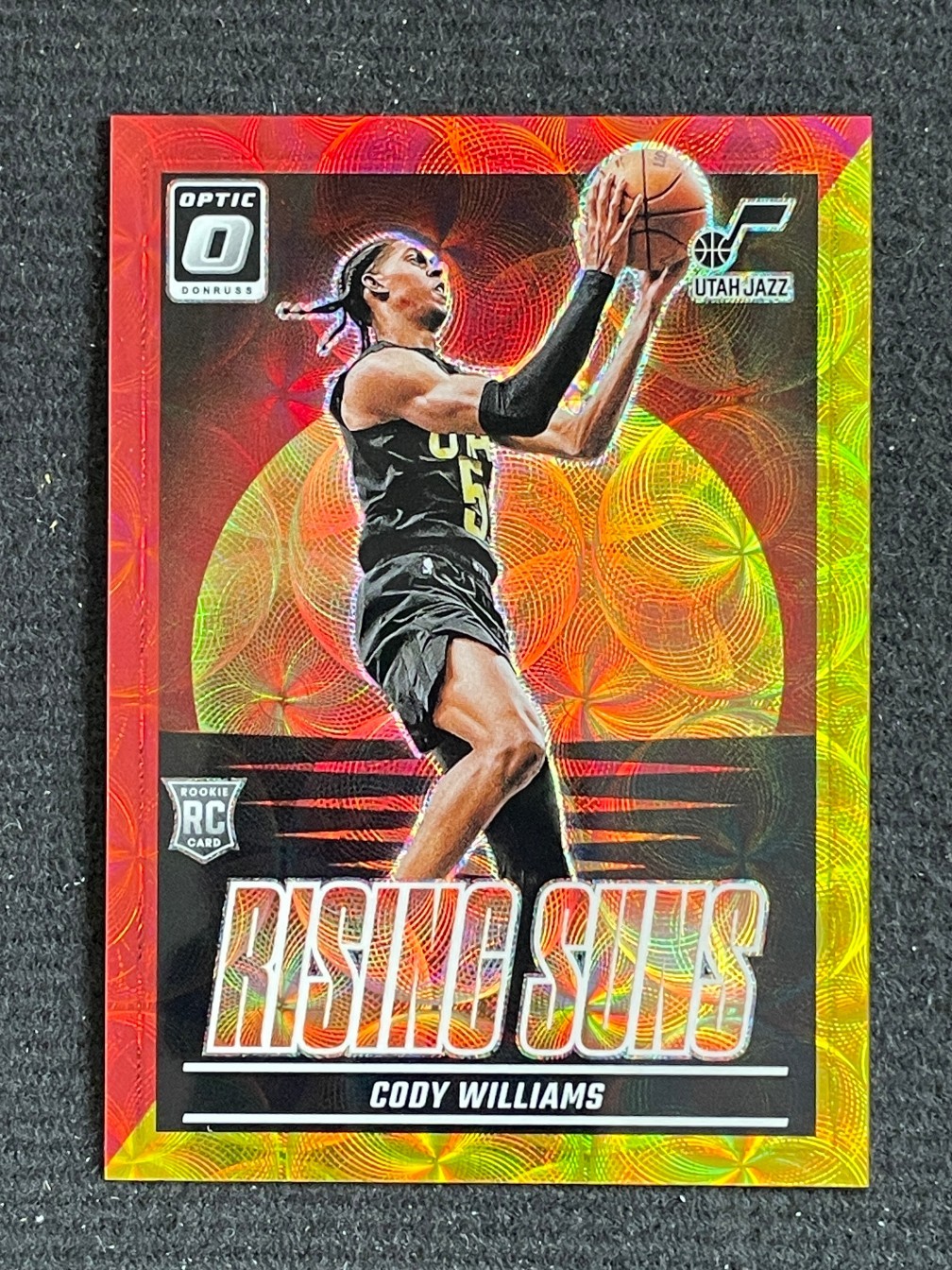 Cody Williams 2024-25 Panini Donruss Optic Rising Suns Red Gold Scope 09/99 RC
