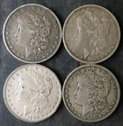 1879, 1883 O, 1896 O, and 1900 O $1 Morgan Silver Dollars