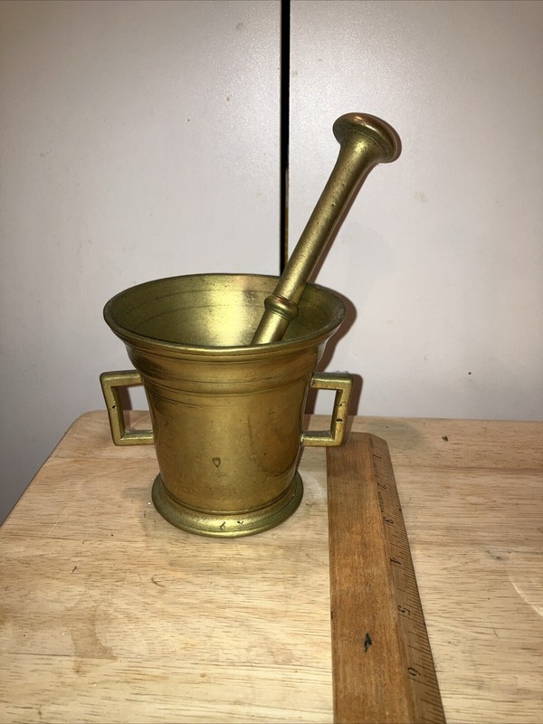 Antique Brass Mortar Pestle Marked CK W Impressed Face Mark 4 1/2” Tall 7 1/2”