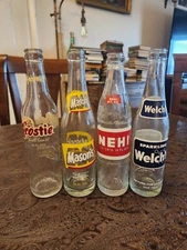 4 Vintage soda/pop bottles. Nehi, Frostie, Welch's, Mason's. All 10oz. 