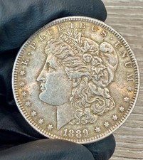US $1 1889-P Morgan Dollar 90% Silver Coin, B.U. Beautiful Carmel Toned Obverse