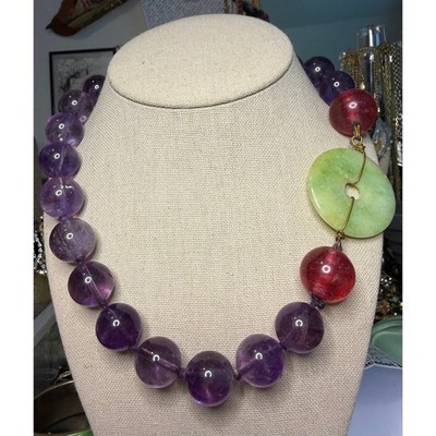 LargePolished Amethyst beads with a jadeite donut closure artisan made hand knot