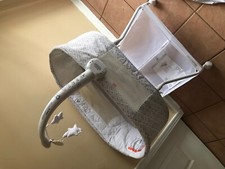 baby bassinet gently used, light weight, has wheels, local pick up only