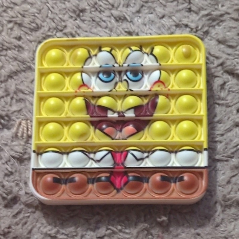 Nickelodeon SpongeBob SquarePants Silicone Pop It Fidget Toy Yellow/White/Brown