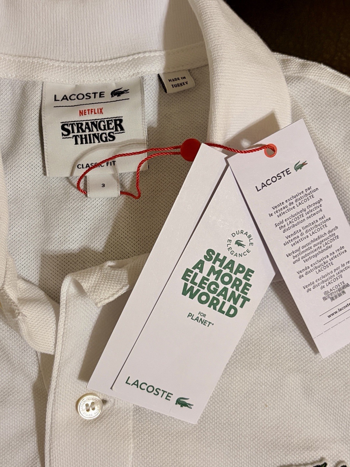 BNWT LACOSTE X Netflix Stranger Things Men White Classic Fit Polo Size 3 Small image 4