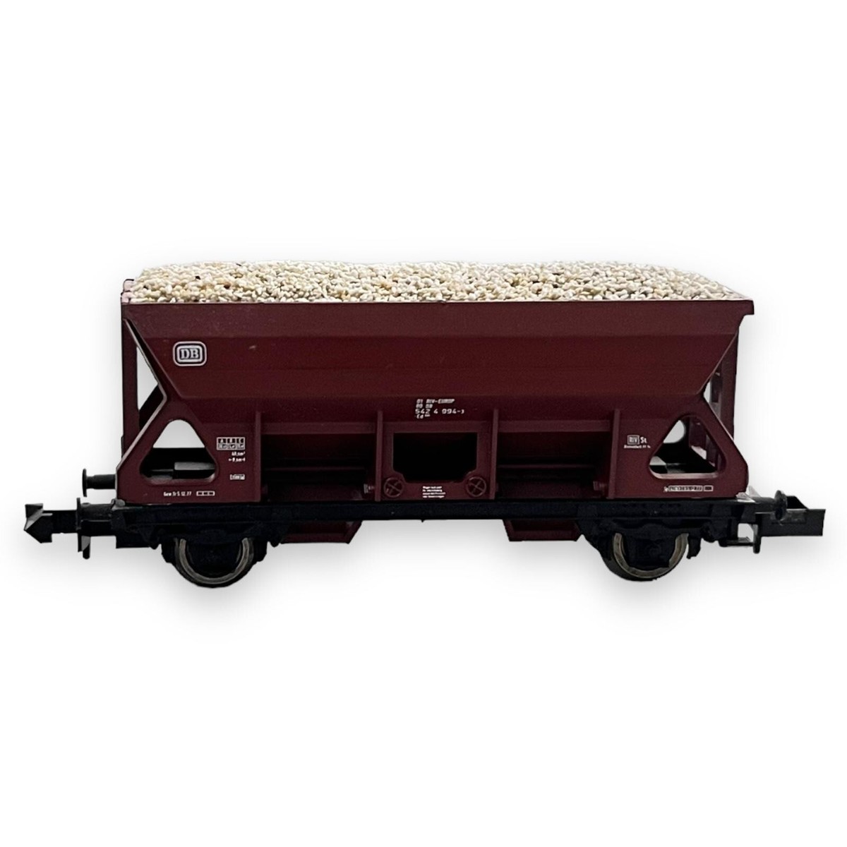 Spur N · Roco 25031 · Selbstentladewagen, 2-achsig, braun · Ladung 