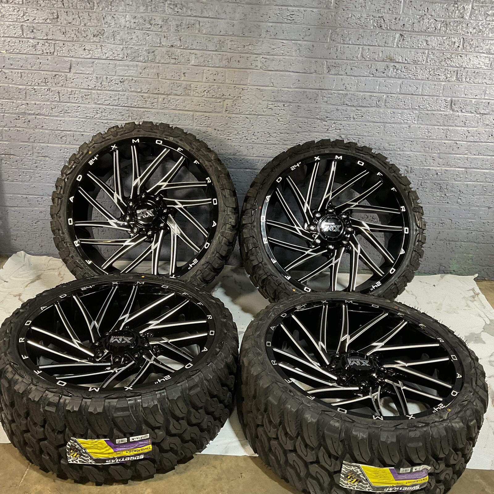 4 24" INCH RIMS/TIRES XM OFFROAD 33X125024 MUD TIRES FORD AND GMC CHEVY