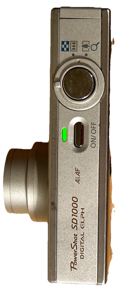 Cámara digital Canon PowerShot ELPH SD1000-PLATA con nueva tarjeta SD y cargador Foto 4 de 4