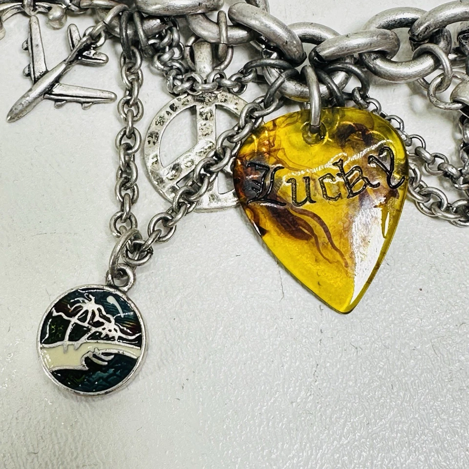 Pulsera Lucky Brand Charm Tono Plata Grueso Guitarra Hawaiana Flor De Lis Hula Foto 3 de 4