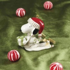 Peanuts Snoopy’s Holiday Gift Ornament (porcelain, 24K gold accents)