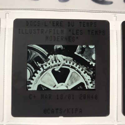 LES TEMPS MODERNE (Charlie Chaplin) - PRESS SLIDE