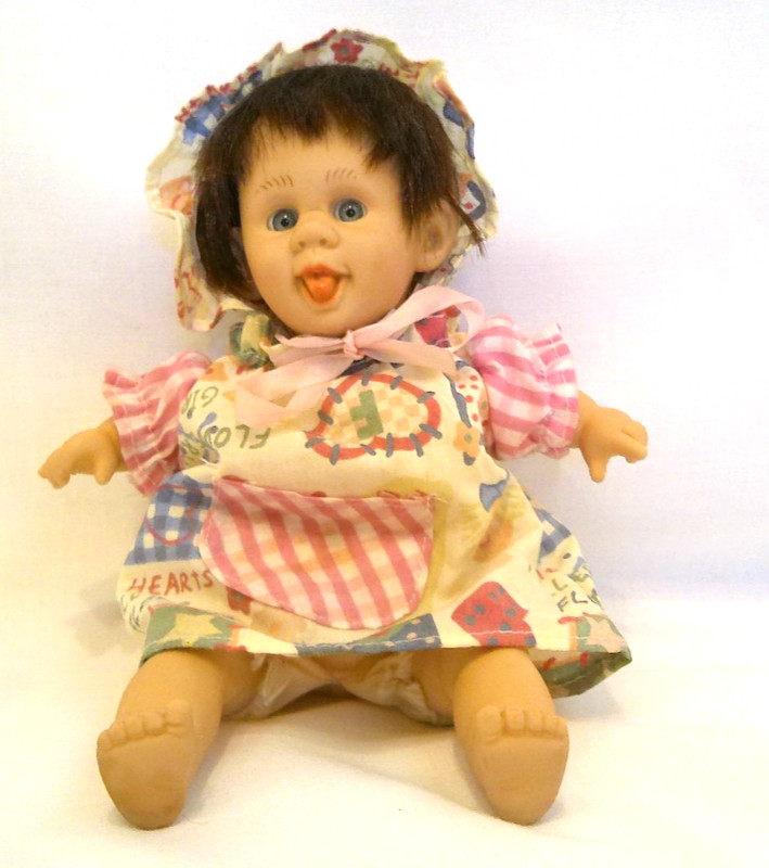 Gi-Go Toys Expressions 8" Palm Pals Sweet Face Sticking Out Tongue Baby Doll