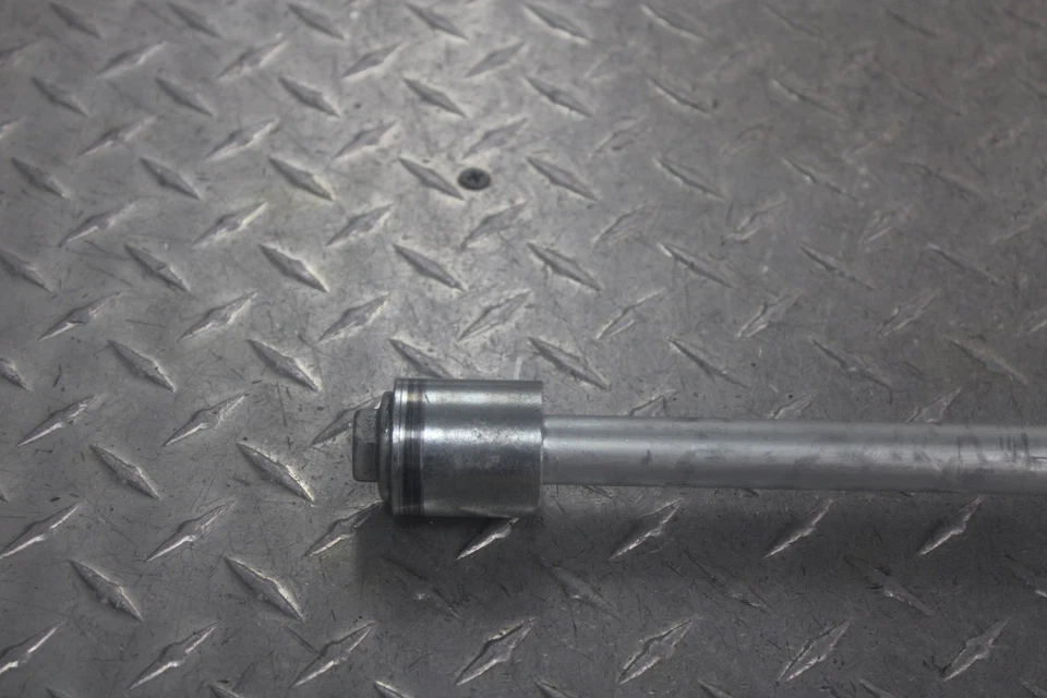 1999 SUZUKI SAVAGE 650 LS650P REAR WHEEL AXLE 64711-24B02 - Image 2 of 4