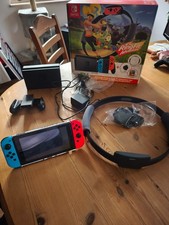 Nintendo Switch 32GB Spielkonsole mit Ring Fit Adventure Schwarz inkl. 4 Spiele