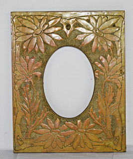 Arts & Crafts hand hammered brass photo frame. c.1910. Daisies