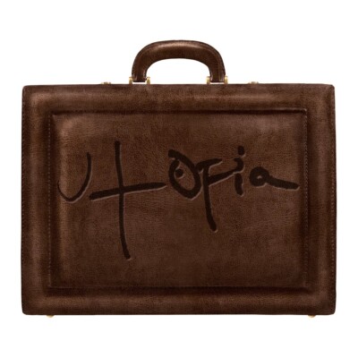 Limited edition brown Travis Scott utopia brief case in unused condition 