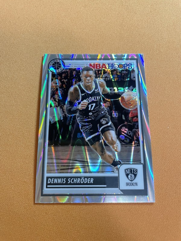 2023-24 Panini NBA Hoops Premium Stock Dennis Schroder Seismic Prizm #153