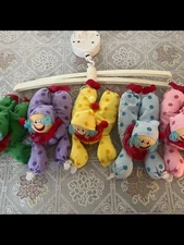 Vintage 1984 Jolly Jumper with 5 Plush Clowns and Music Box. 1/1 on ebay. HTF