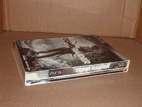 Tomb Raider (PlayStation 3 PS3, 2013) gioco edizione speciale con copertina e libro - Foto 2 di 13