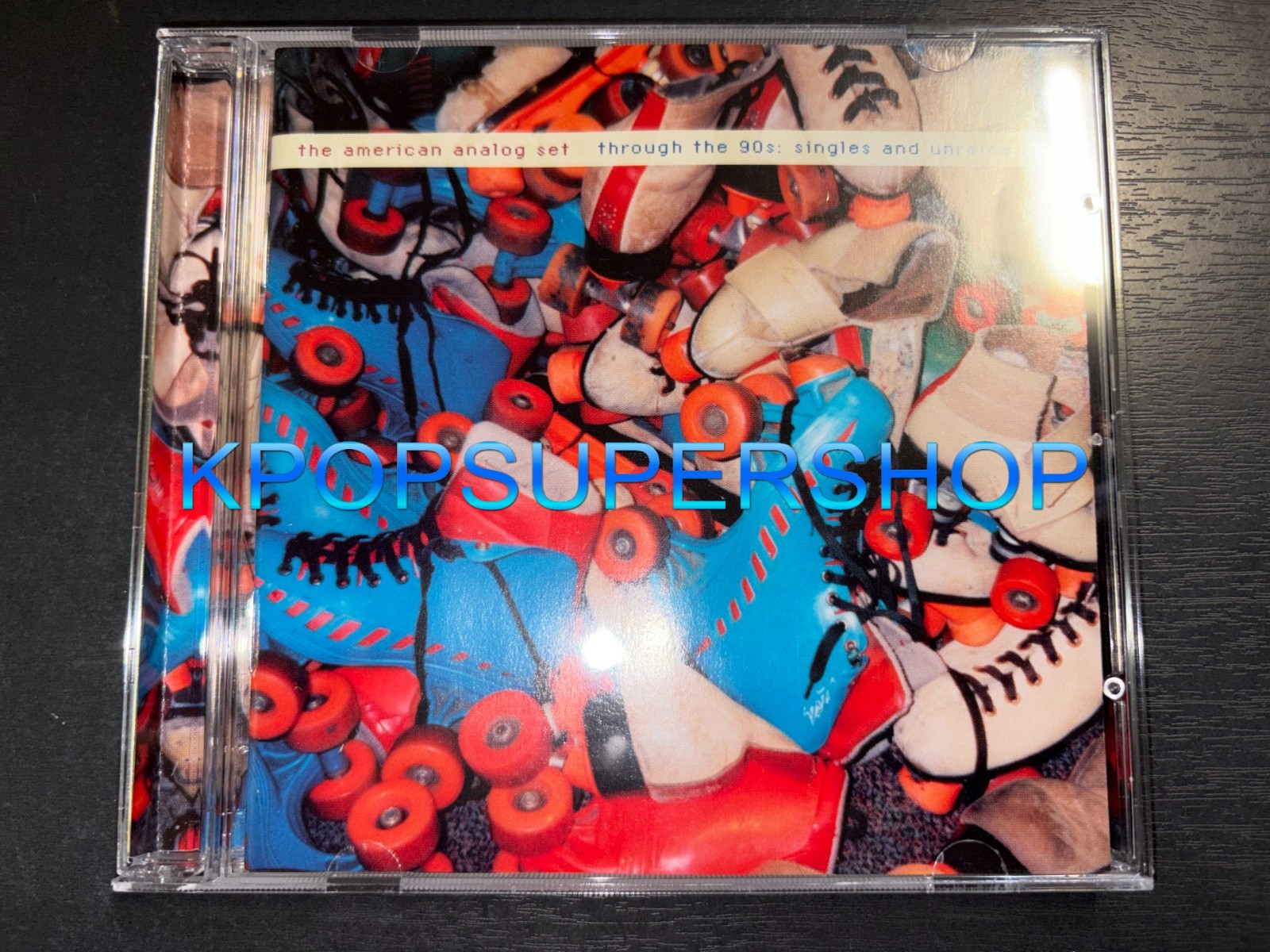 Through The 90s: Singles And Unreleased CD