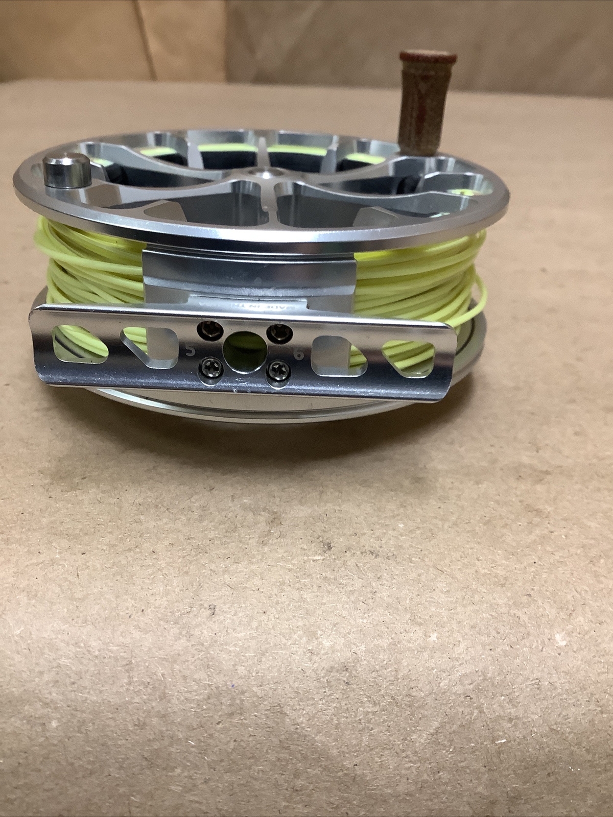 Ross Evolution LTX 5/6 Silver Fly Fishing Reel With Yellow/Green Line In Case
