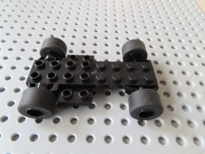 Lego 1 x Fahrgestell Rückziehmotor 10039c01 schwarz + 4 Reifen Sicks schwarz - Bild 1 von 3