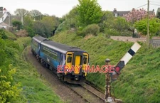 PHOTO  2-CAR 156  156437 APPROACHES STRANRAER STATION.