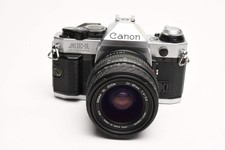Canon AE-1 Program 35mm SLR Camera w/Sigma 35-80mm Zoom, New Seals