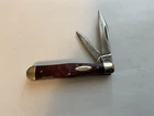 VINTAGE CASE XX 25 1/2 SMALL COKE BOTTLE, 1973 REDDISH BONE HANDLES USED