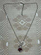 SILVER TONE NECKLACE WITH A CRYSTAL ENCRUSTED RABBIT WITH LARGE PINK JEWEL