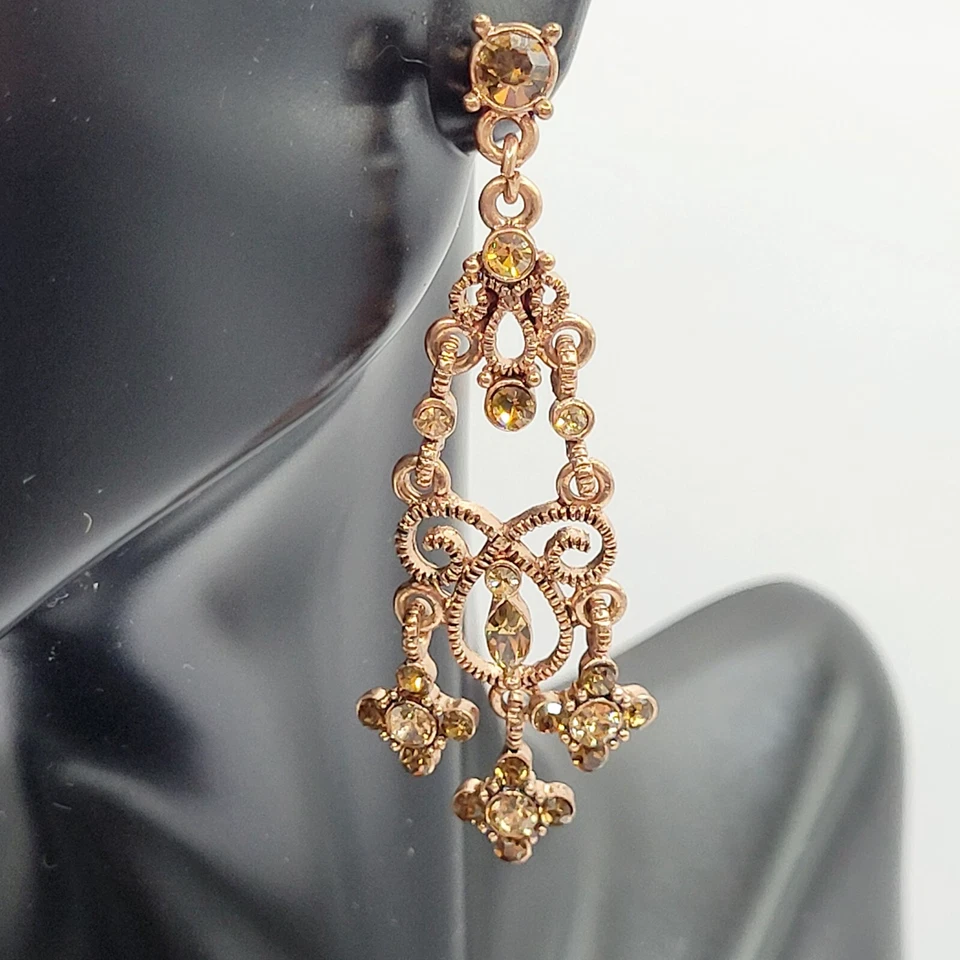 Pendientes perforados dramáticos con araña de cristal de 1928 cristales ámbar tono cobre Foto 2 de 4