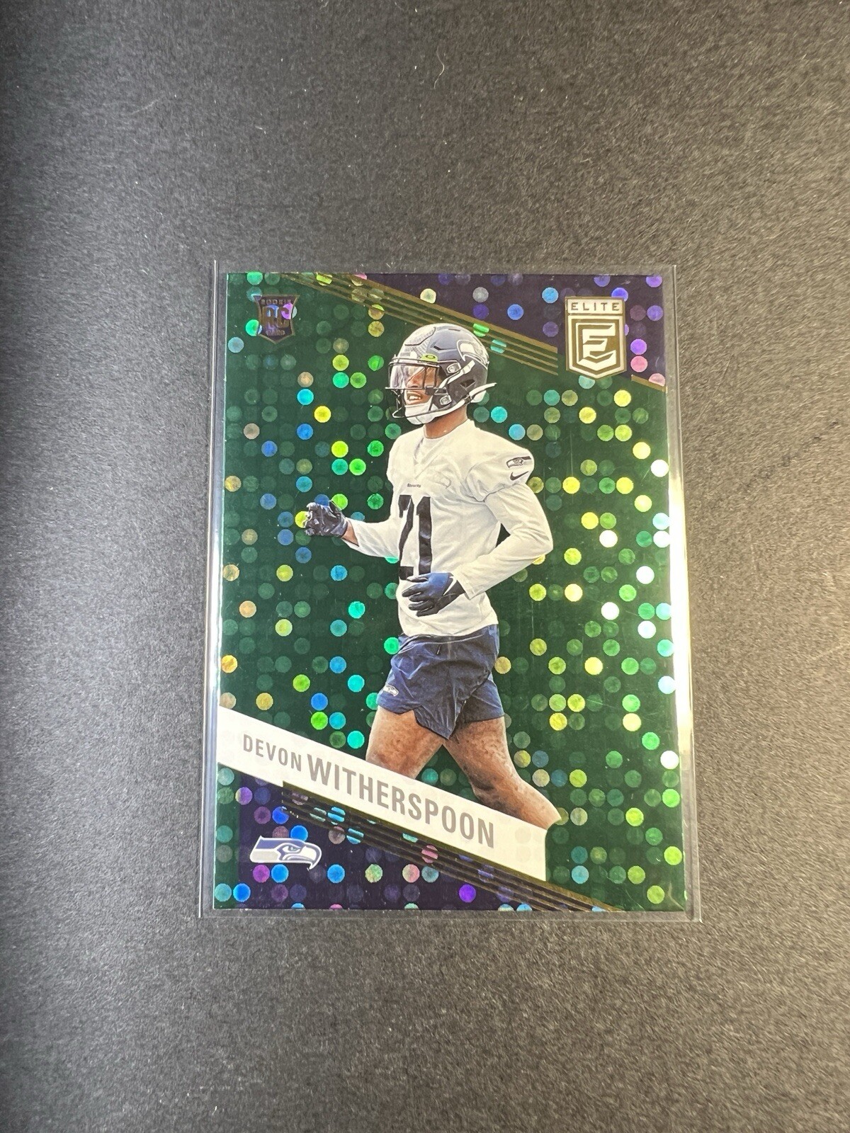 2023 Panini Donruss Elite - Rookies Green Disco #133 Devon Witherspoon (RC)