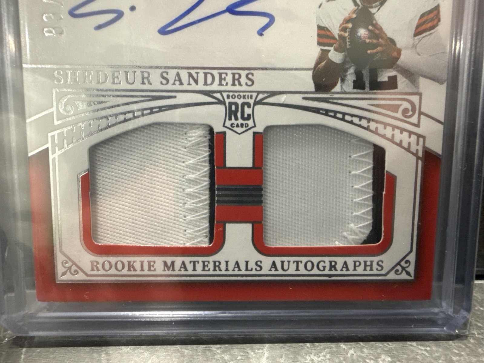 2025 Panini National Treasures Shedeur Sanders QUAD Rookie Patch Auto 83/99 view 2