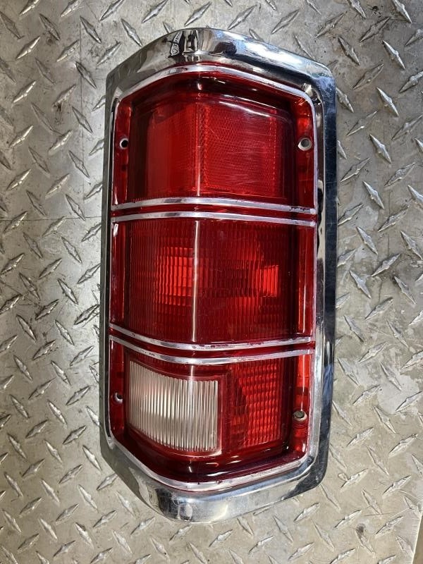 81-84 Dodge 100 Pickup Passenger Tail Light Sweptline with Bezel 1229510