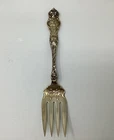 1902 R. Wallace And Sons Sterling Silver Serving Fork  Cherub