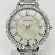 Reloj Mujer Armitron 32mm Tono Plateado MOP Cristales Pavimentado 50M Batería Nueva 7.25"