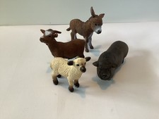Schleich,4 verschiedene Jungtiere: Esel, Ziege, Schaf, Hängebauchschwein