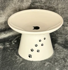 White Necoichi Pedestal Cat Bowl with Black Paw Prints for Pampered Cats