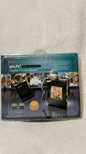 The Sharper Image Digital Photo Album with USB 2.0 Rechargeable Keychain