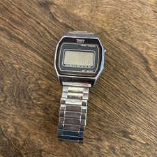 Reloj Timex Hombre Plateado Acero Inoxidable Resistente al Agua K Celda Digital Cuarzo ASIS