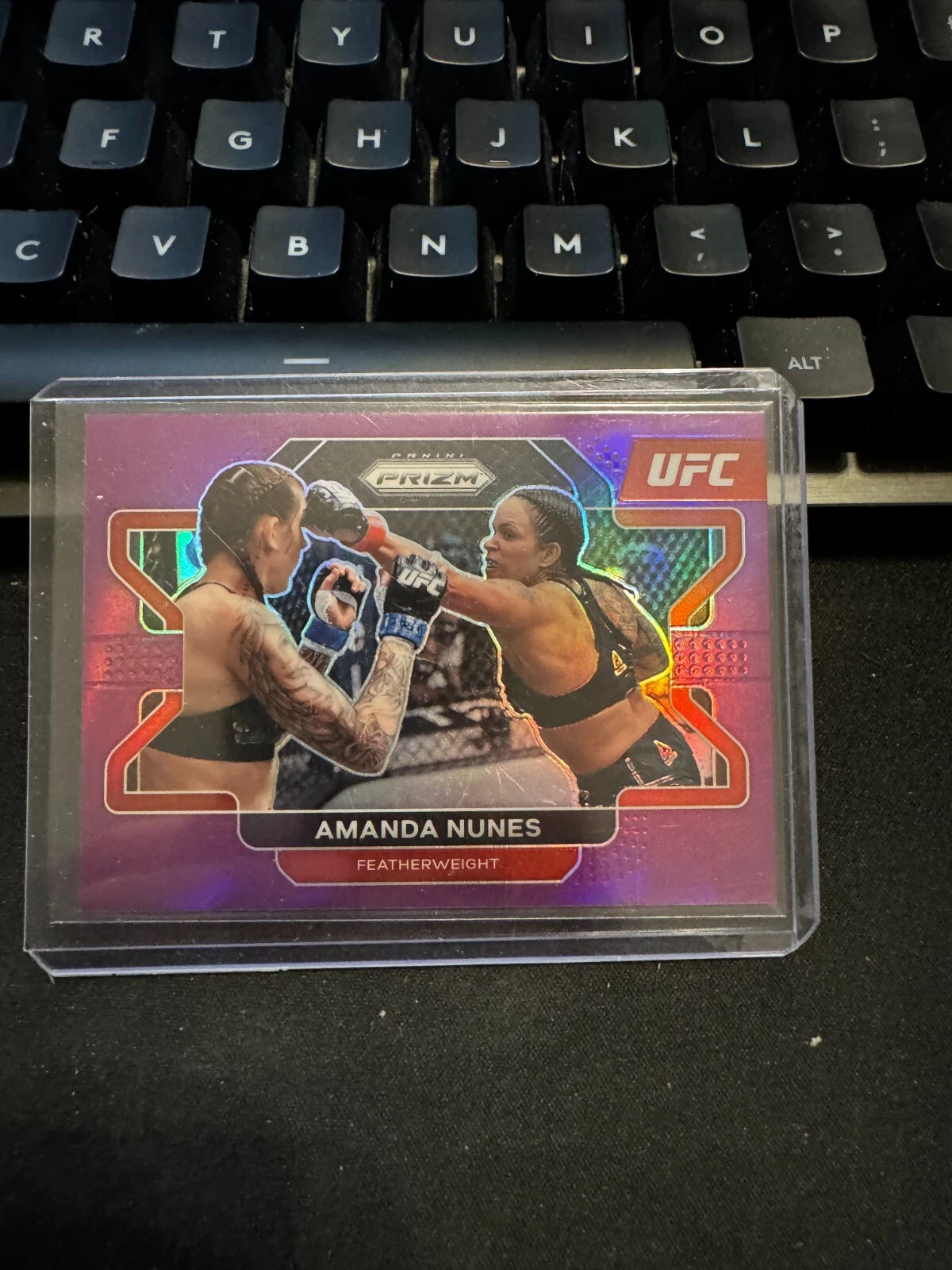 Amanda Nunes 2022 Panini UFC Prizm Purple Prizm #d /149 #65 Champion