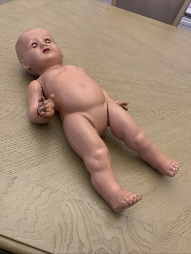 white 430mm or 17” jointed doll with closed mouth painted eyes. impress hair.14B - Picture 7 of 10