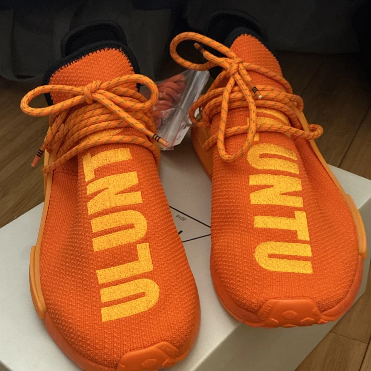 adidas gazelle silver green womens Adidas x Pharrell Williams Men's HU NMD Orange Low Top Sneakers