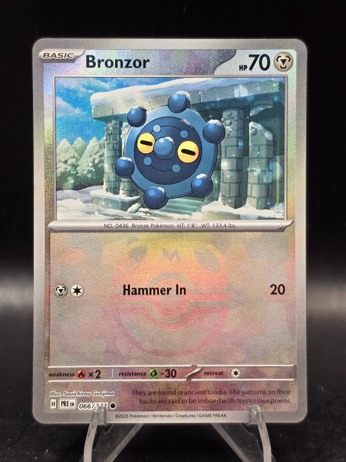 Pokemon TCG Bronzor (Master Ball Pattern) 066/131 Prismatic Evolutions Holo NM