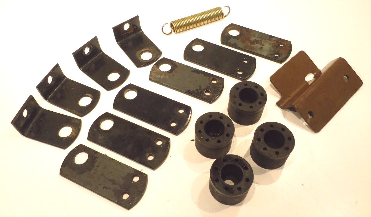 OEM LOT OF MISC. PARTS MOUNT / BUSHINGS / EXTENSION SPRING