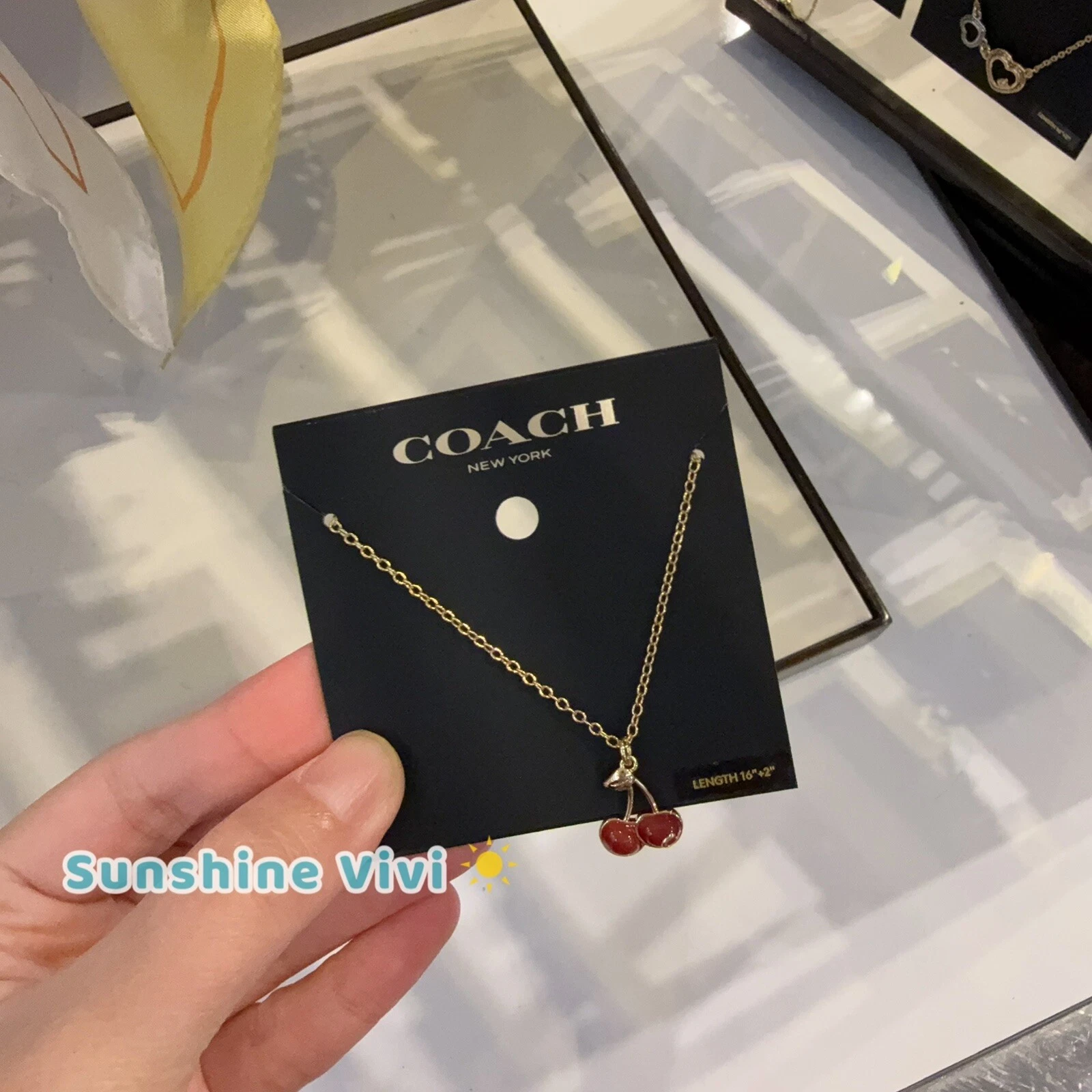 NUOVA collana con ciondolo ciliegia Coach oro rosso CAA18