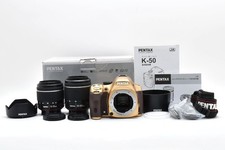 2847 shutter releases. Pentax K-50 body, custom gold color. Double zoom kit 18-