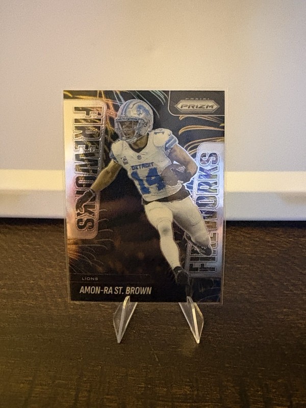 2025 Panini Prizm - Fireworks Amon-Ra St. Brown #16